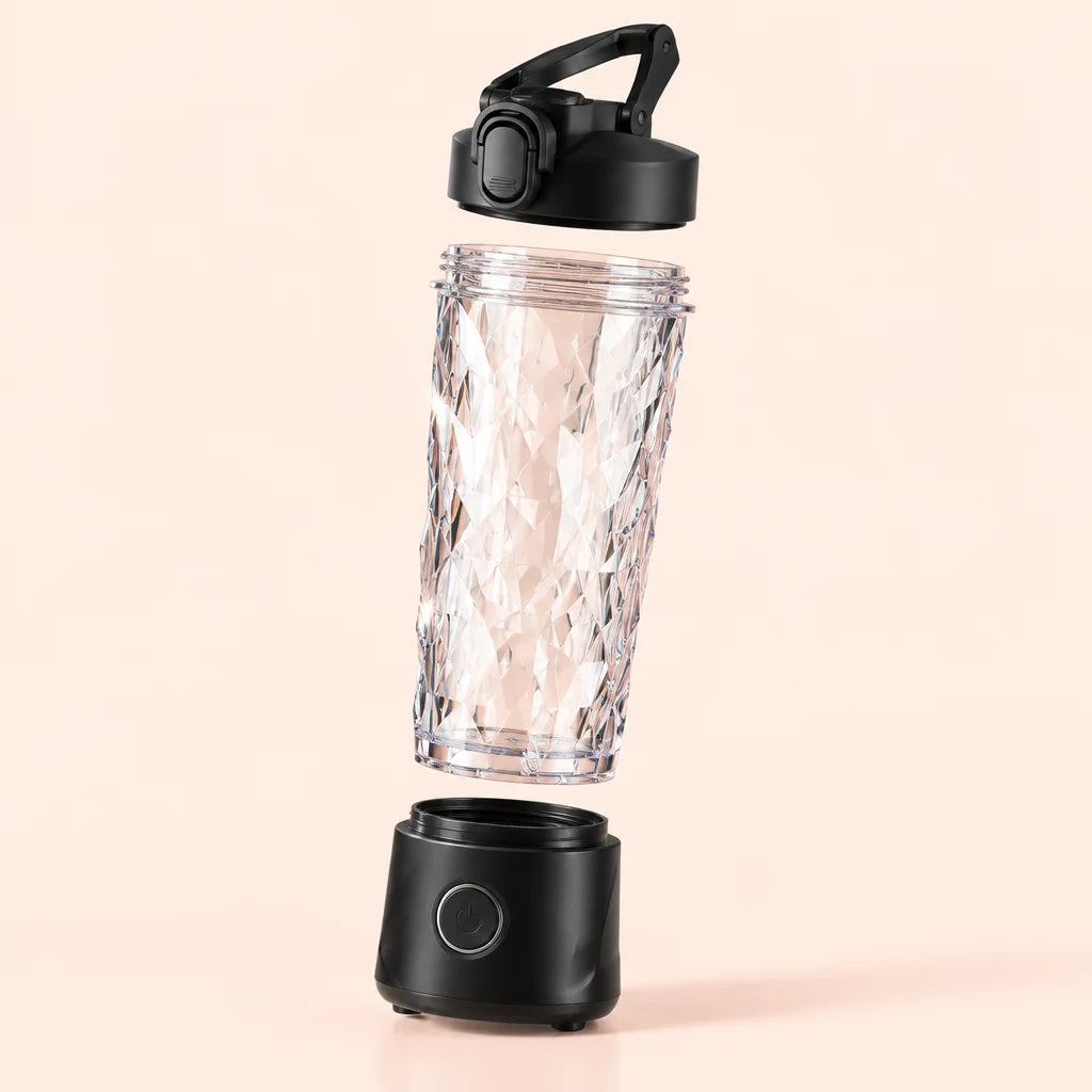 A studio photograph showing the reference Blendiva shaker separated into its actual main parts: one
